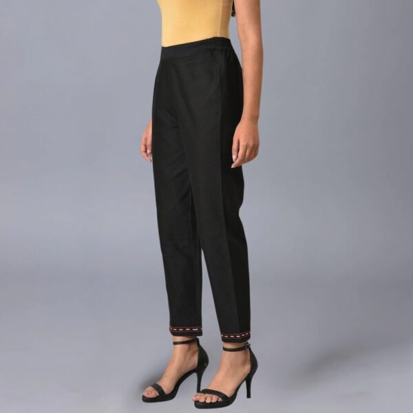 Black Slim Pants With Embroidery At Hemline - Image 2