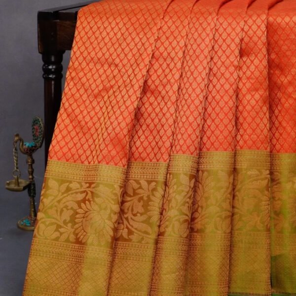 Gadwal silk saree reddish orange and dual shade of green with allover zari woven brocade weaves and long floral zari woven border
