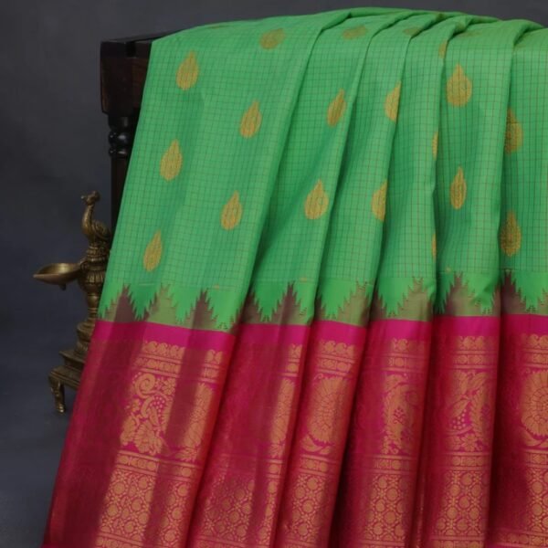 Pure gadwal silk saree light green and pink with allover zari checked pattern & zari buttas and long zari woven border