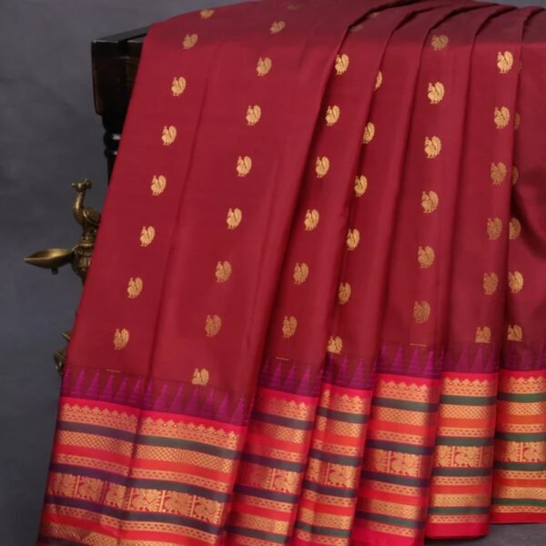 Pure gadwal silk saree maroon and pink with annam zari woven buttas and temple deisgn zari woven border