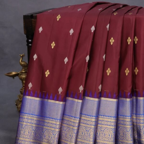 Pure gadwal silk saree deep maroon and blue with silver & gold zari woven buttas and long zari woven border