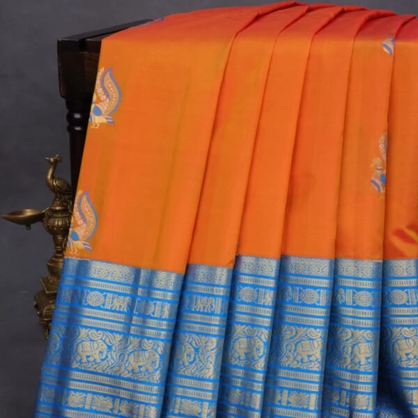 Pure gadwal silk saree sunset orange and cs blue with thread & zari woven buttas and long zari woven border