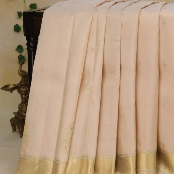 Pure kanchipuram silk saree cream with zari woven buttas and zari woven border