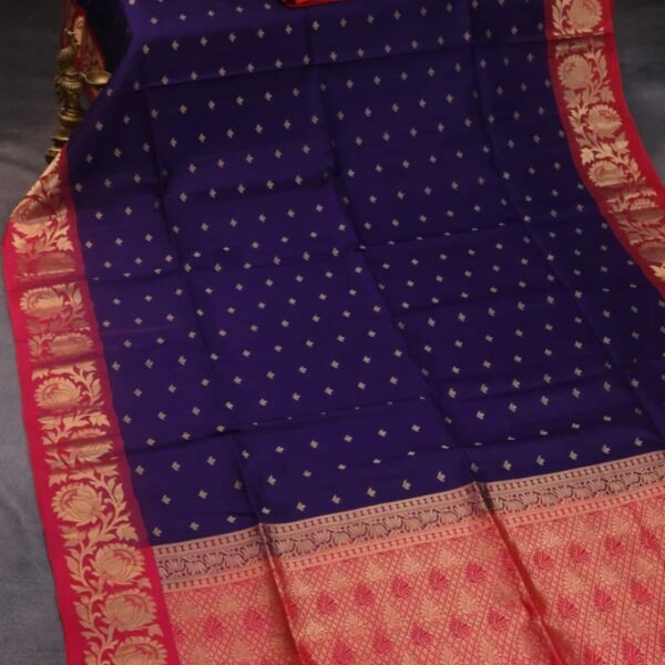 Pure soft silk saree blue and dual shade of pinkish orange with allover zari woven buttas and floral zari woven border - Image 2