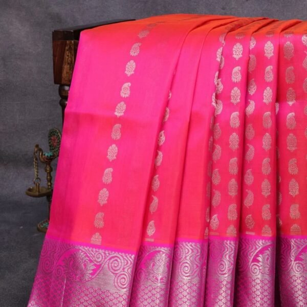 Venkatagiri silk saree dual shade of pinkish orange and pink with allover silver zari woven butta weaves and silver zari woven border